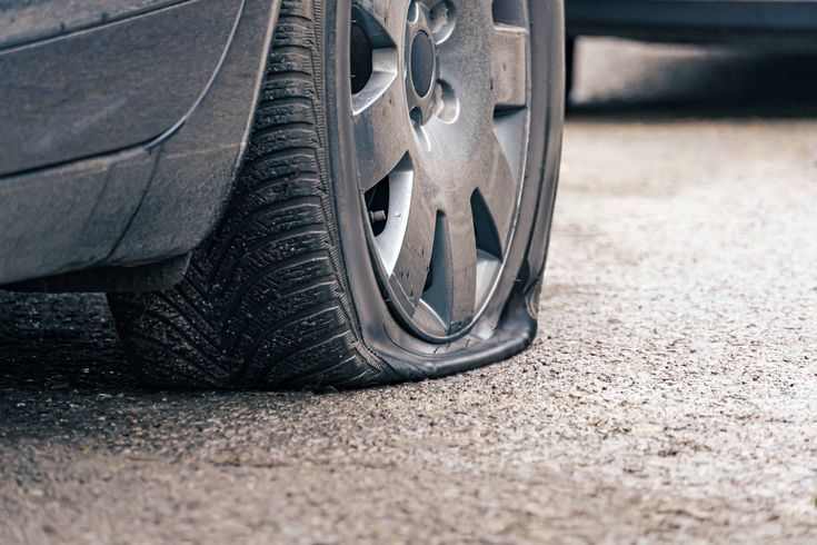 mobile tyre repair roadside puncture service technician fixing tyre